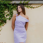 model wears a Purple Off Shoulder Mini Dress