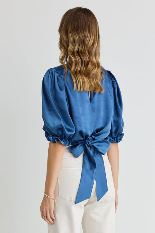 model wears Blue Satin Short Sleeve Top