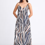 A strappy dress with a tie-back detail and bold chocolate and cream zebra print. Fully lined for comfort, made from a soft viscose-nylon blend.