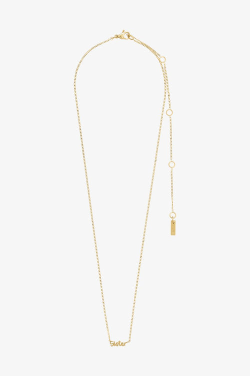 gold necklace with a pendant reading 