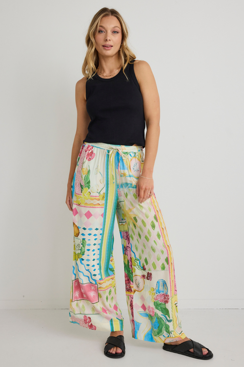 model wears Pink Yellow Holiday Print Pant