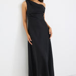 model wears an off the shoulder black linen maxi dress