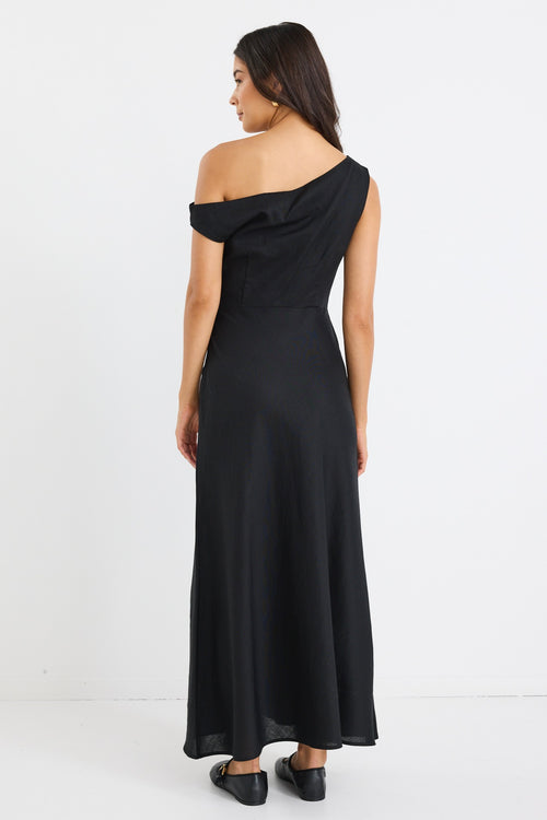 model wears an off the shoulder black linen maxi dress