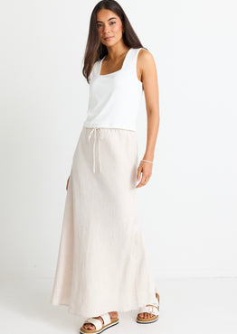 model wears a natural linen skirt