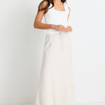 model wears a natural linen skirt