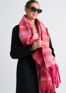 Model wears a pink and orange scarf