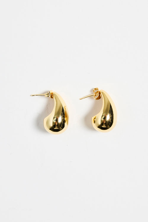 gold-plated brass stud earrings with a smooth, teardrop shape, photographed flat on a white background.