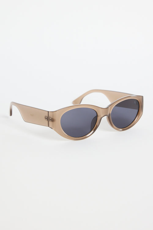 Espresso-brown cat-eye sunglasses with dark tinted lenses, photographed on a white background