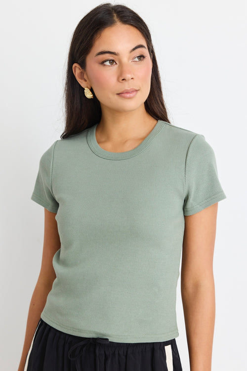 model wears a green rib tee