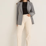 model wears a grey blazer