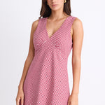 A sleeveless red and white gingham mini dress with a flattering V-neckline. Fully lined for comfort, made from 100% Cotton for a breathable, natural feel.