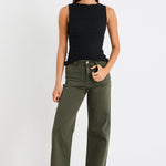 Woman wearing khaki jeans and a black top