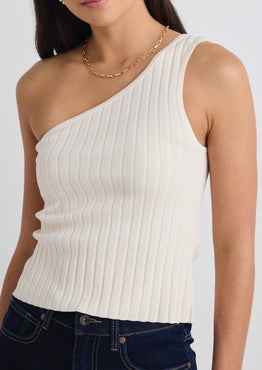 model wears a beige one shoulder top