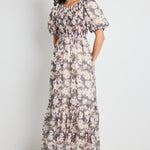 Model wears floral maxi dress