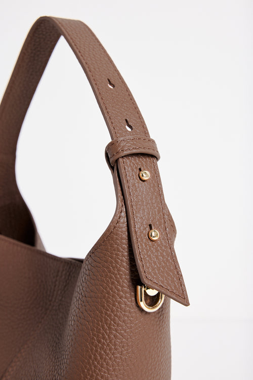 Valencia Brown Leather Multi Strap Mini Tote Bag in a structured bucket silhouette featuring pebbled brown leather, an adjustable shoulder strap and gold hardware, photographed against a clean white background
