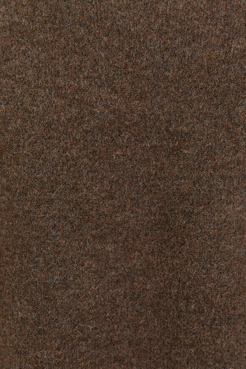 Close-up of a brown sweater with visible texture