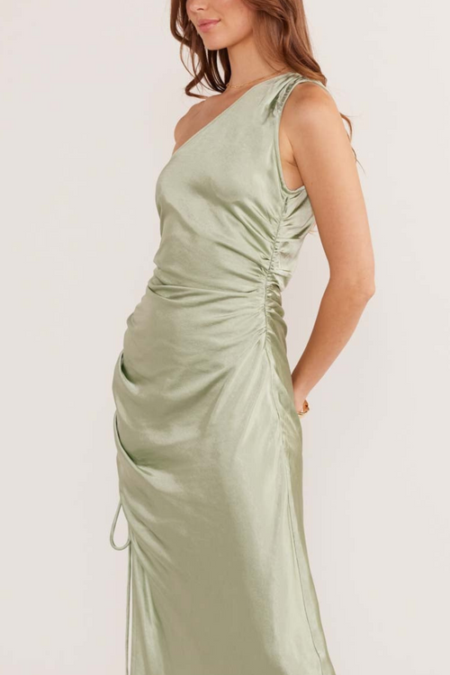 model wears green satin midi dress