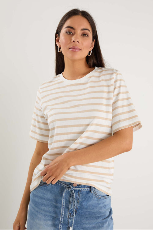 model wearing white striped tee