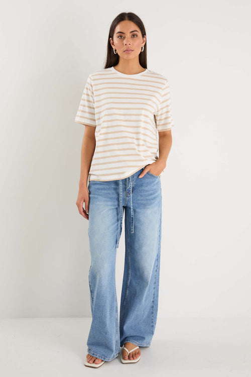 model wearing white striped tee