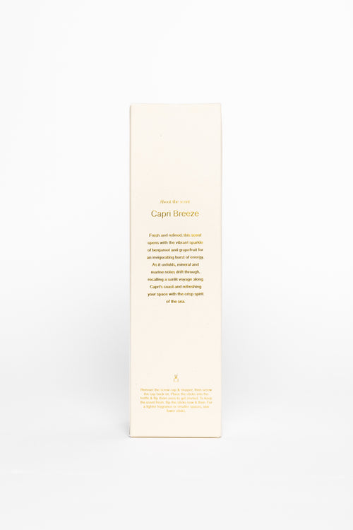 Long, narrow product packaging with text on a white background