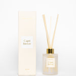 Capri Breeze diffuser bottle and packaging on a white background