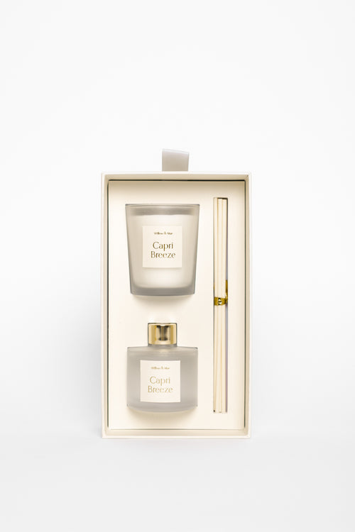 Cape Breeze candle set with two candles and a holder in a decorative box on a white background