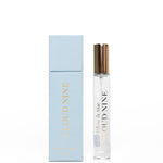 Perfume bottle and packaging with 'Nine' branding on a white background