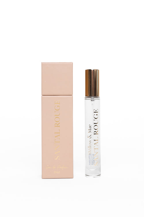 Perfume bottle and packaging with 'Sue Thal' branding on a white background