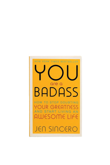 Book cover of 'You Are a Badass' by Jen Sincero with an orange background and black text.