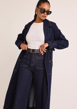 model wears a Blue Denim Trench Coat