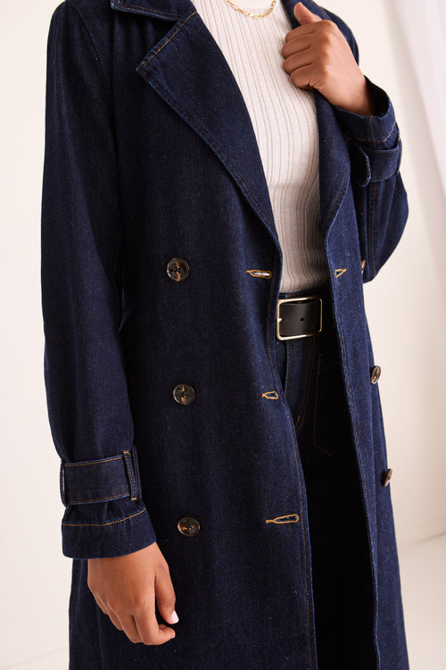 model wears a Blue Denim Trench Coat