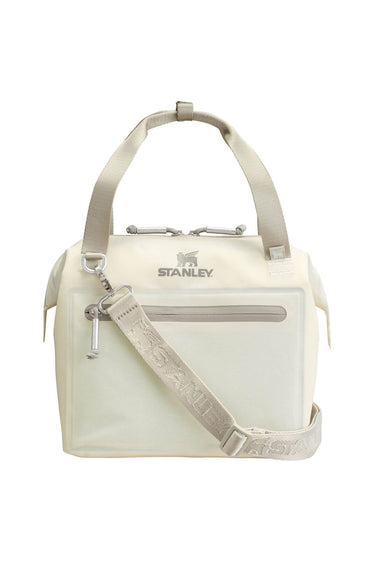 A cream-colored Stanley tote bag with a matching patterned shoulder strap, silver-tone hardware, and the Stanley logo on the front, set against a plain white background.