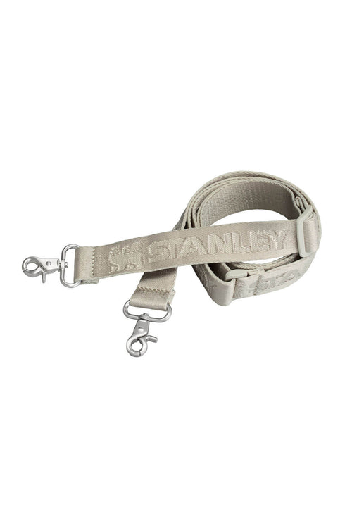 A light beige nylon dog leash with silver metal swivel clamps, featuring the embossed brand name 'STANLEY' on the strap, shown on a plain white background.