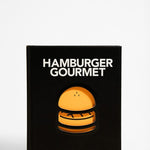 Front cover of a cookbook titled " Hamburger Gourmet"