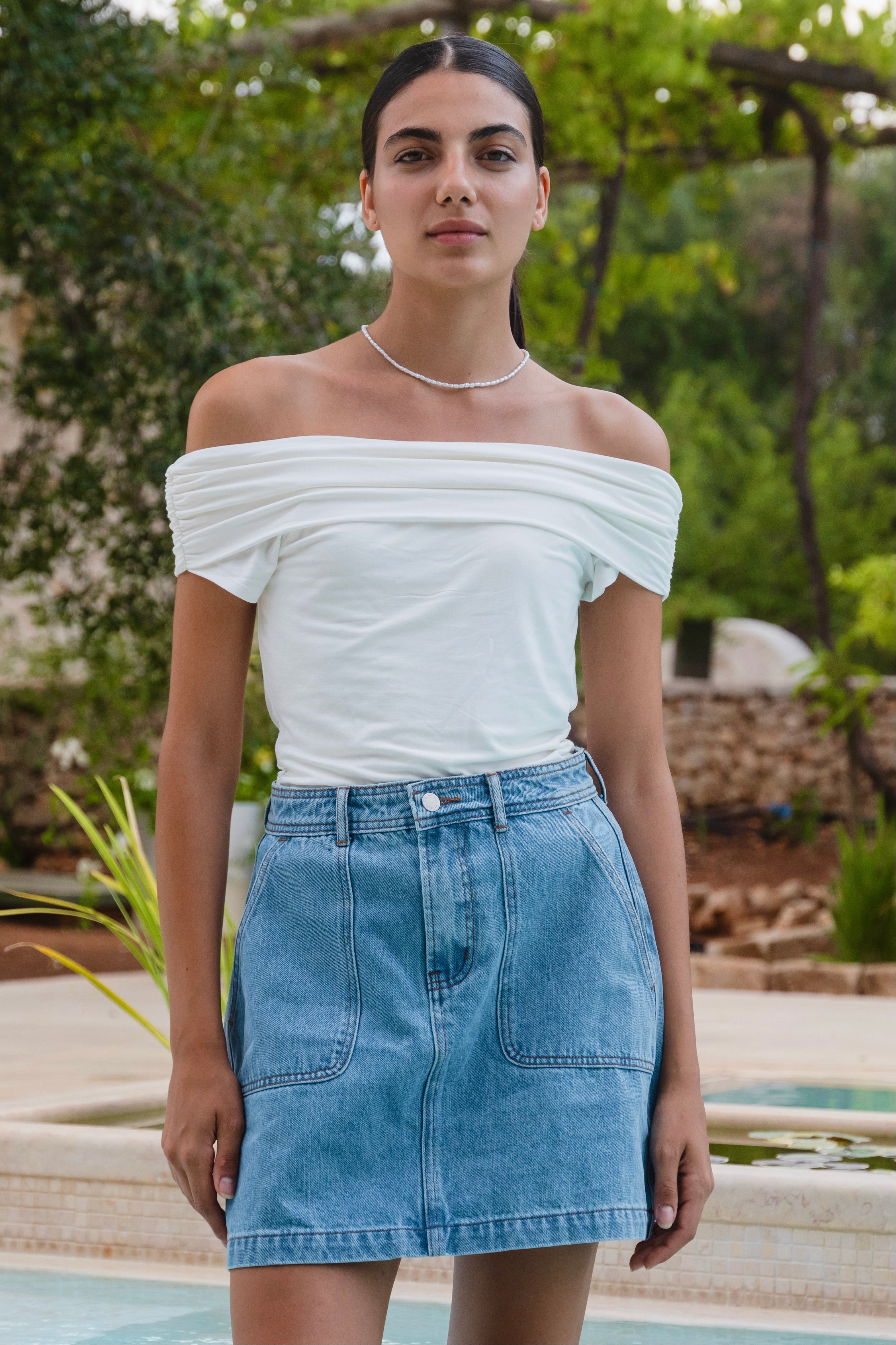 Shop Orchard Mid Blue Pocket Front Denim Mini Skirt | Flo & Frankie