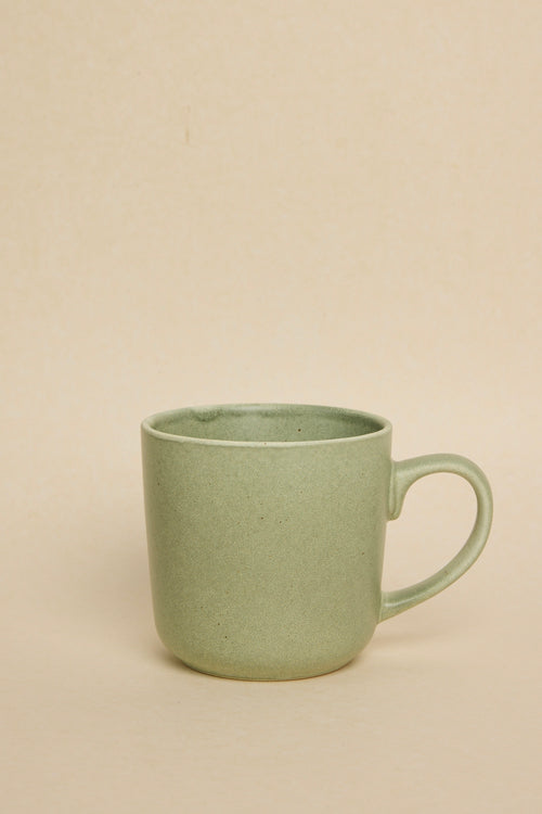 green coffee mug