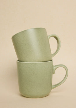 green coffee mug