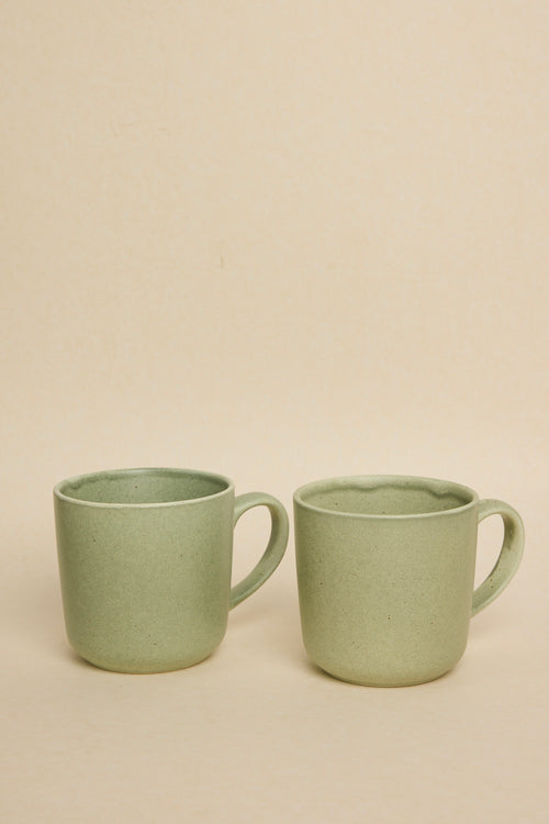 green coffee mug