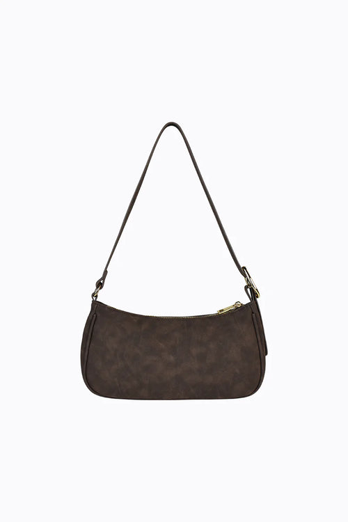 Brown handbag with a pattern on a white background