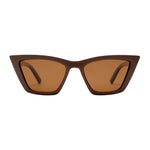 A pair of cat-eye sunglasses with a dark brown acetate frame and warm brown tinted lenses, shown against a plain white background.