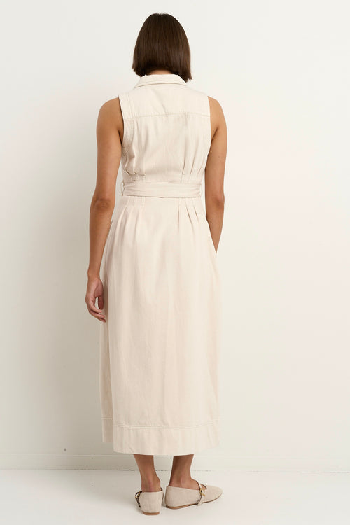 model wears a sleeveless ecru denim midi dress
