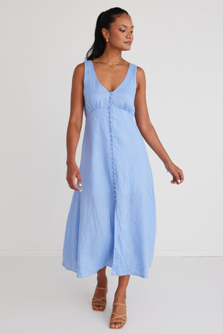 model is wearing a blue linen dress
