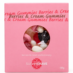 A pink box of Sugarcrave Berries & Cream Gummies, featuring a circular window that displays the assorted gummies inside, set against a plain white background.