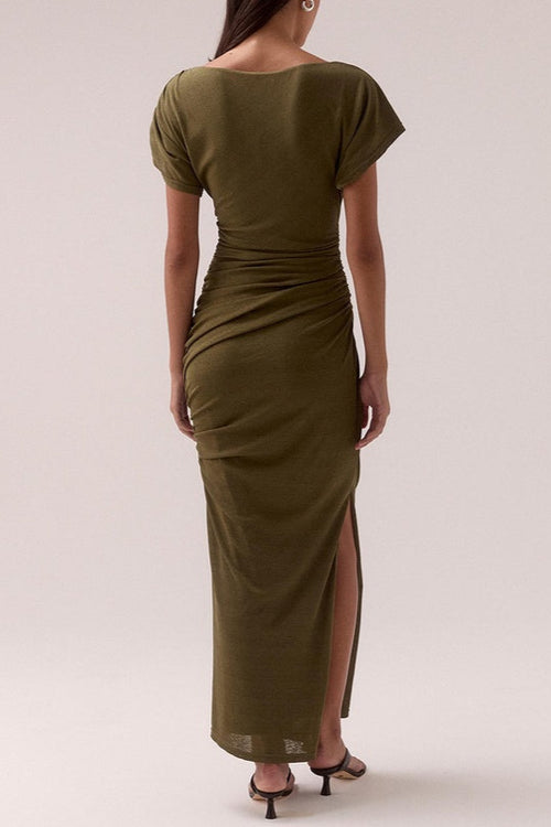 model wears a olive green ruched dress