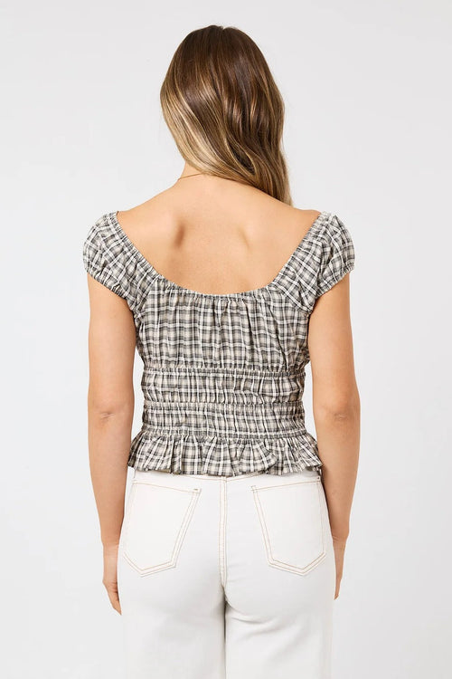 The Tilda Top in Sage Check styled with white jeans