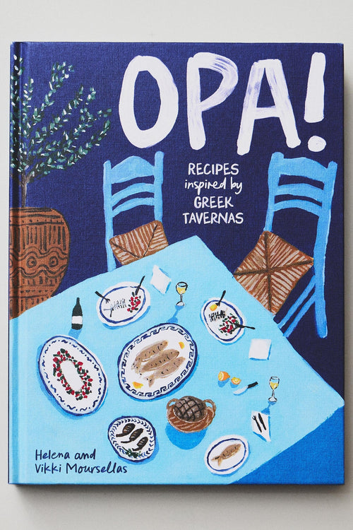 A hardcover cookbook titled 'OPA! Recipes inspired by Greek Tavernas' by Helena and Vikki Mousselas, featuring a colorful illustration of a dining table on the cover.