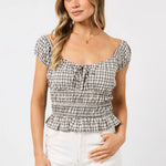 The Tilda Top in Sage Check styled with white jeans