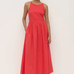 Woman wearing a red midi dress 