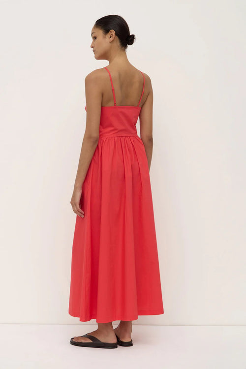 Woman wearing a red midi dress 