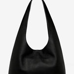 Black leather handbag on a light gray background